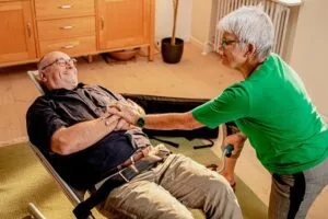 Raizer M – Manual Lifting Chair – In use – O Neill Healthcare