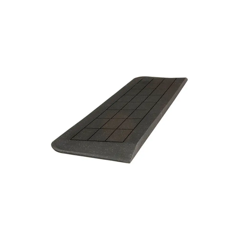 Doorline Neatedge2 - O Neill Healthcare Black rectangular rubber mat with a grid pattern, shown at an angle, conveying a non-slip surface.