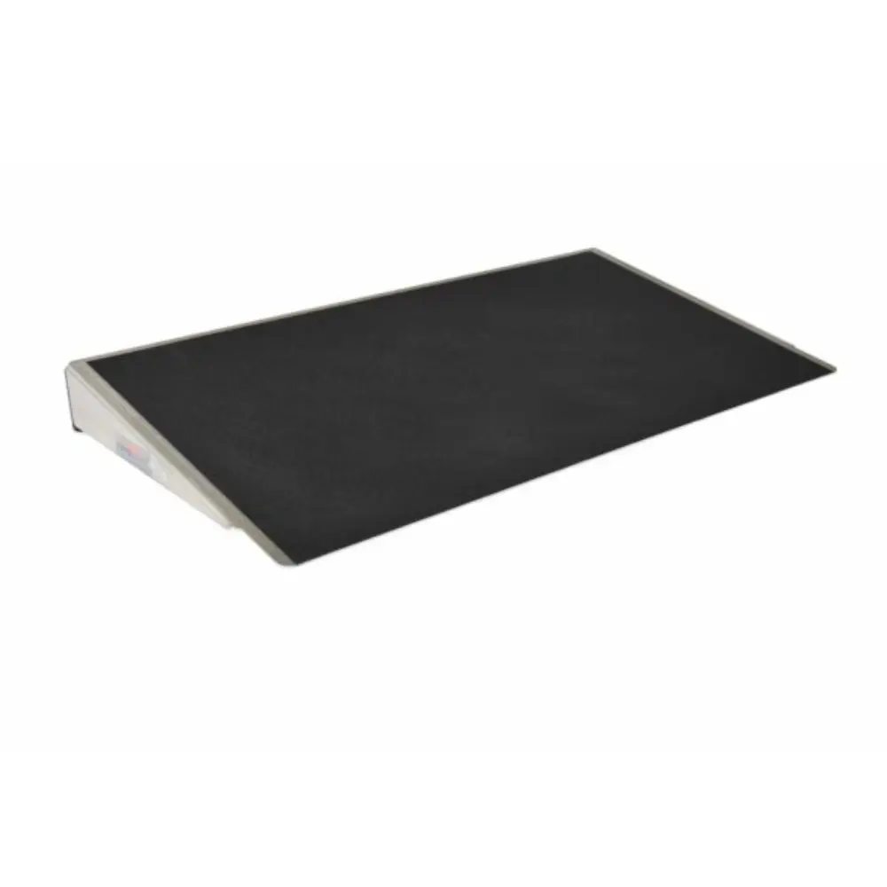 Doorline Threshold Wedge1 - O Neill Healthcare Flat black drawing tablet surface with a silver control panel on the left side